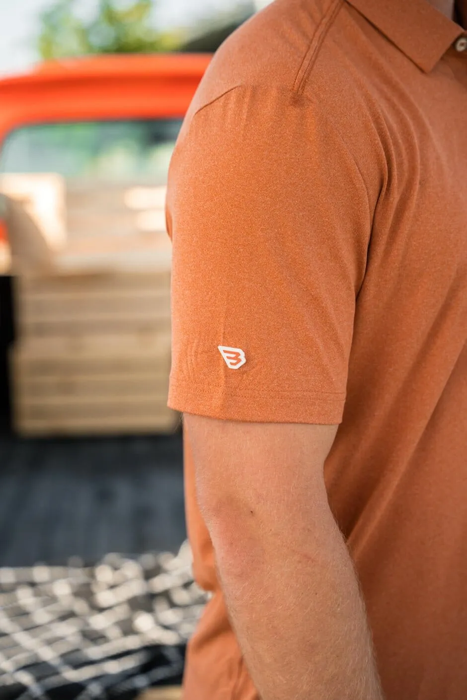 Performance Polo - Heather Orange
