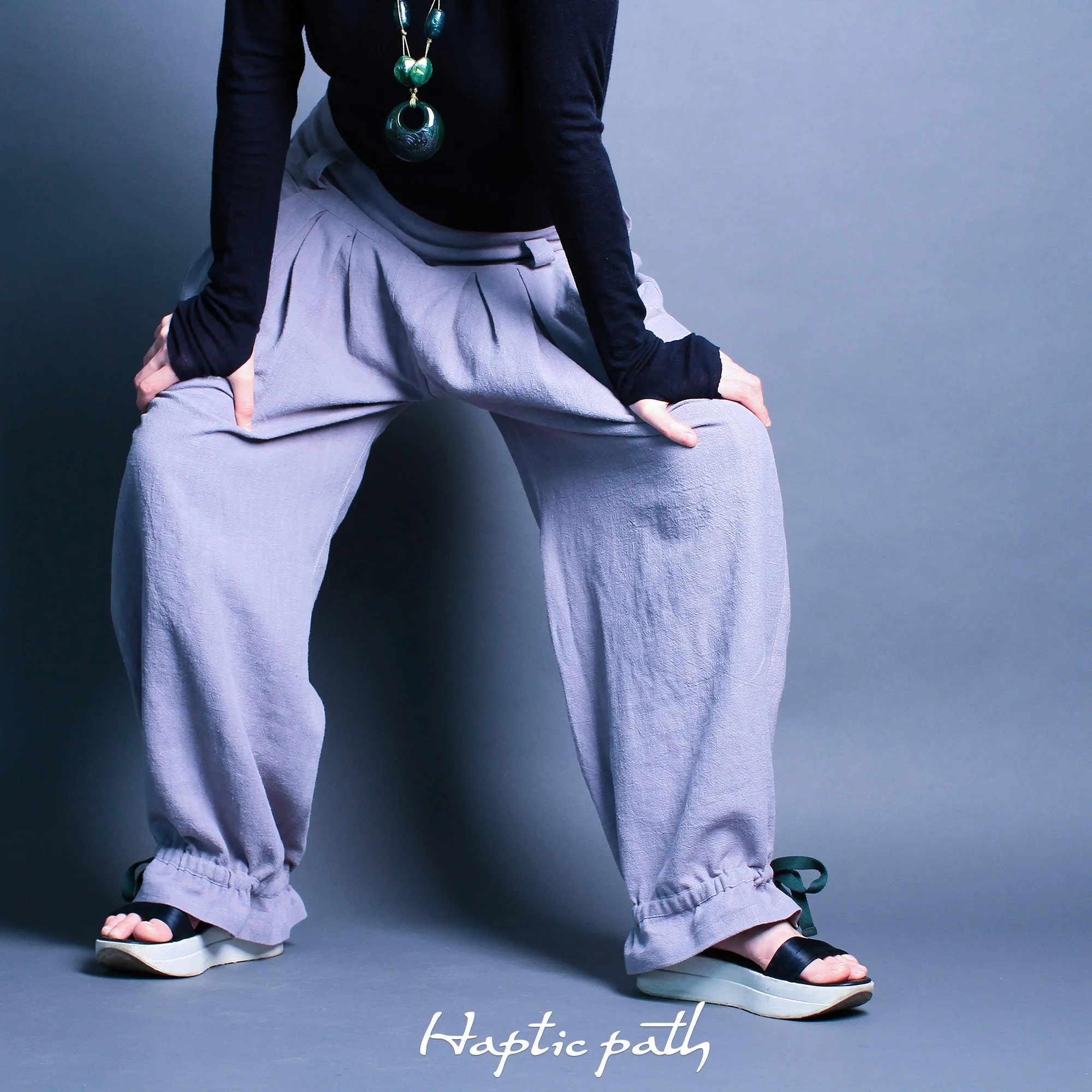 Wide trousers with flexible belt